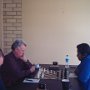 Booth takes on Wijesuriya. Russell Murray (foreground)